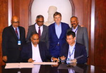 Caption for logo: Tata and Analog Devices announce strategic alliance to explore joint opportunities for semiconductor ecosystem in India Caption for photo: MoU signing ceremony as Tata and Analog Devices announce a strategic alliance to explore joint opportunities for the semiconductor ecosystem in India. Names/Titles of people in MoU photo: • Standing (left to right): Dr. Randhir Thakur (CEO and Managing Director, Tata Electronics), N Chandrasekaran (Chairman of Tata Sons), Vincent Roche (CEO and Chair at ADI), Vivek Jain (Executive Vice President, Global Operations and Technology at ADI) • Sitting (left to right): Shailesh Chandra (Managing Director, Tata Motors Passenger Vehicles Limited and Tata Passenger Electric Mobility Limited), Jerry Fan (Senior Vice President, APJC Sales President, ADI Asia Pacific)